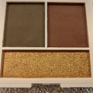 Revolution Eyeshadow Palette with Gold, Brown, and Green Shades